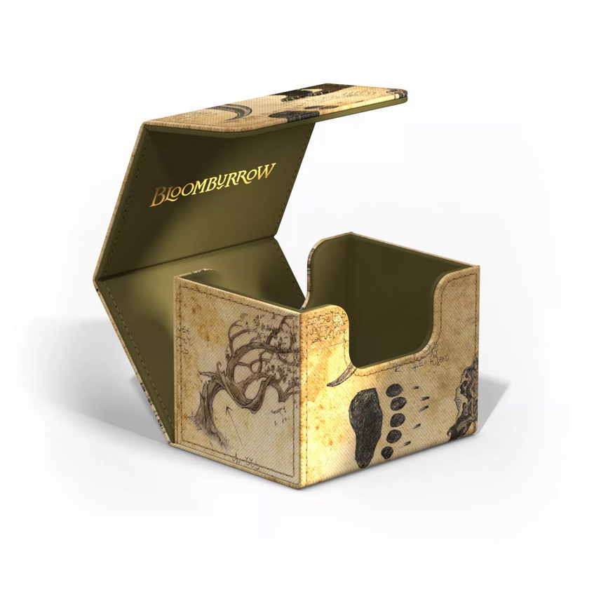 The Lumra deck box opened up, showing how the box opens and revealing a golden Bloomburrow logo