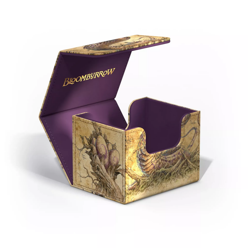 The Rottenmouth Viper deck box opened up, showing how the box opens and revealing a golden Bloomburrow logo