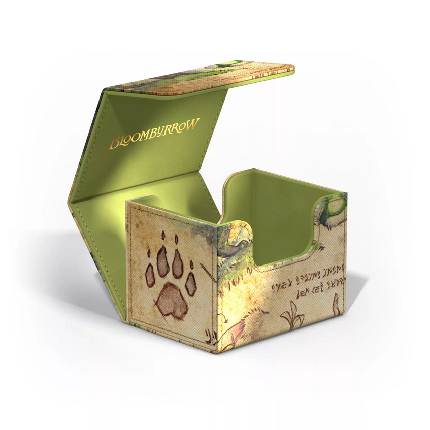 The Ygra deck box opened up, showing how the box opens and revealing a golden Bloomburrow logo